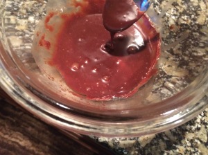 Photo of chocolate dripping off a spoon.